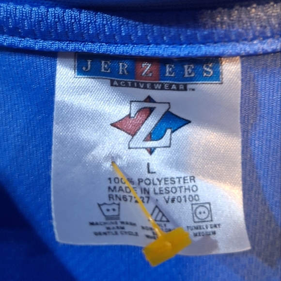 A Jerzees Blue V-Neck Men's Shirt in a Mens Size Large. - Picture 3 of 7